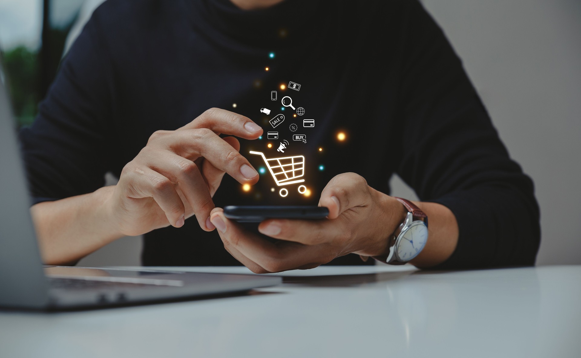 Young man using smartphone with shopping cart icon.