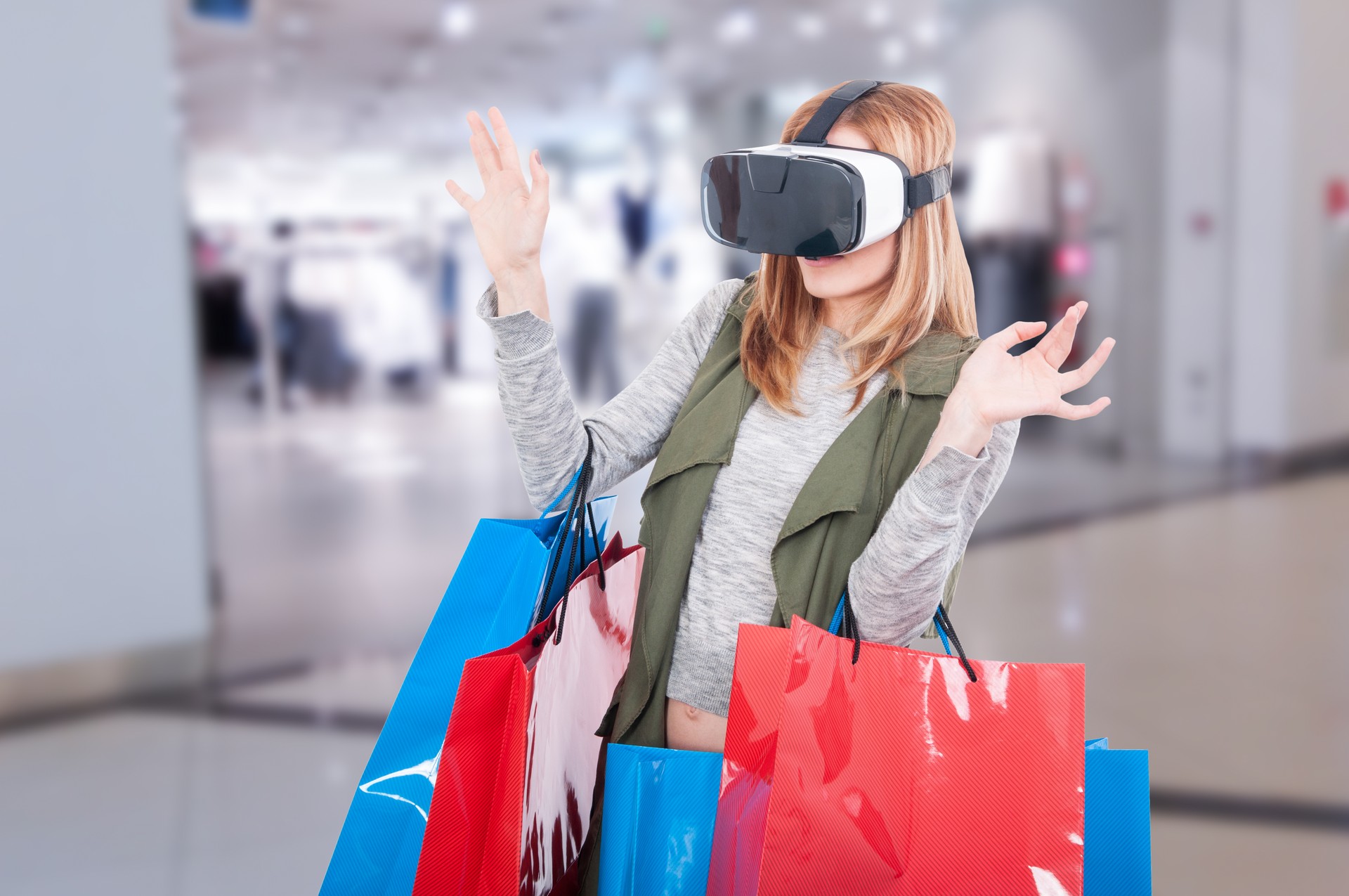 Woman feeling scared when using virtual reality glasses